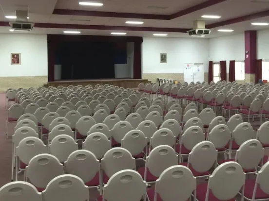 Chairs lined up in front of a perth community centre stage before a presentation